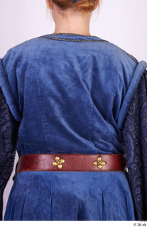  Photos Woman in Historical Dress 106 17th century blue jacket brown leather belt historical clothing upper body 0002.jpg